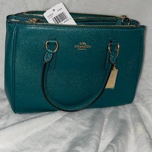 Emerald colored Coach bag